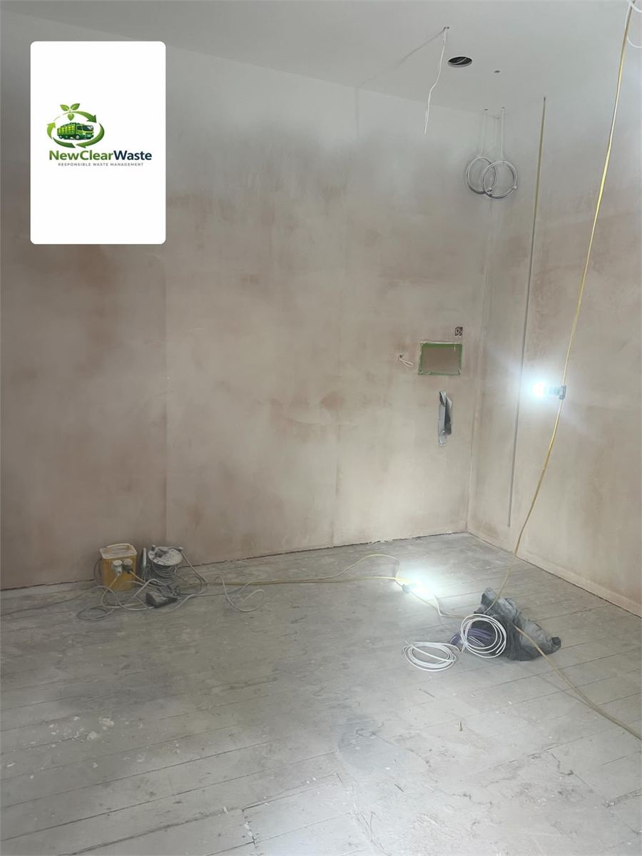 Renovation room cleared with floor and work lights left accessible